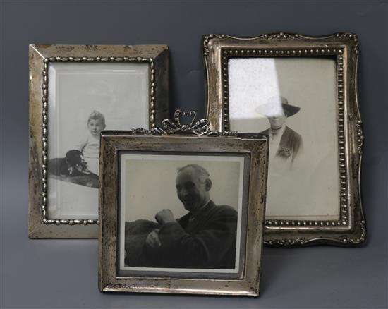 Three assorted silver mounted photograph frames.